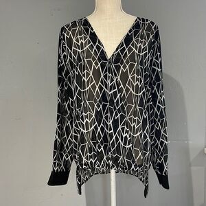 Bisou Bisou sheer long sleeve black and white blouse, longer in the back